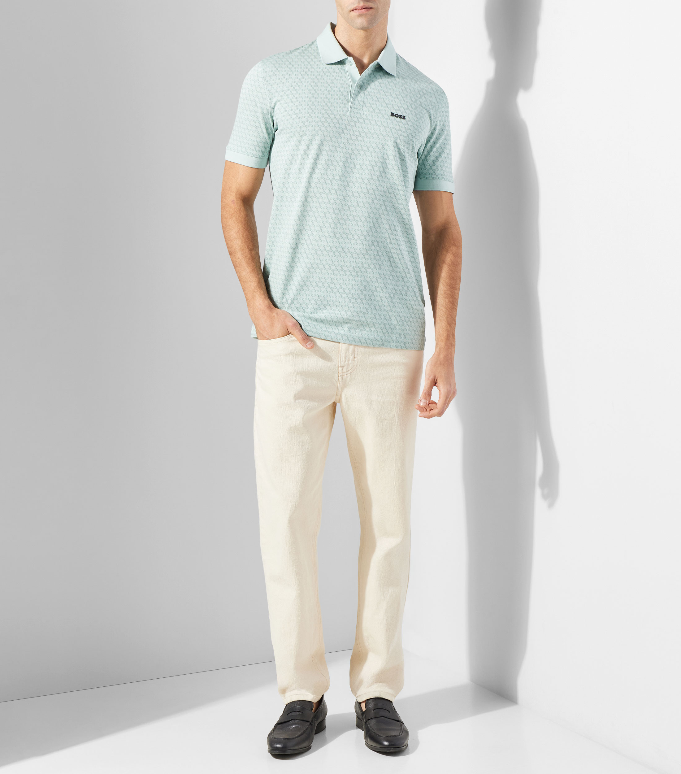 Playera tipo polo de piqué con patrón estampado Hombre